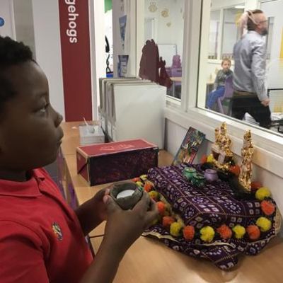 We celebrated Diwali in school by dressing up in traditional clothing, learning the story of Diwali and making clay divas.